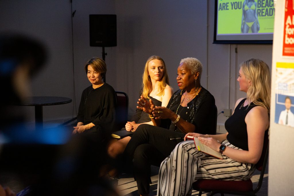 Women speaking on panel