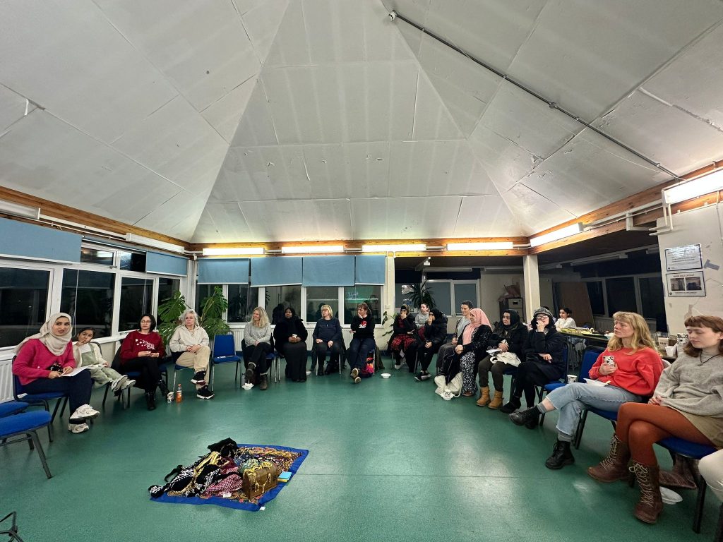 Group of women sitting in a circle for a talk